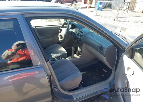 2001 Toyota Corolla Ce from USA, damaged, VIN 1NXBR12E21Z495868